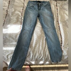 Buckle Black Midrise Skinny Jeans